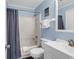 The bathroom has a tub/shower and a vanity sink for convenience at 1310 N Waccamaw Dr. # 208, Garden City Beach, SC 29576