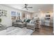 Open-concept living area with a sectional sofa, leading into the dining and kitchen space at 1504 Oyster Bay Ct., Myrtle Beach, SC 29588