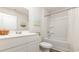 Clean bathroom with a white vanity, bathtub, and contemporary decor at 153 Leyland Cypress Dr, Conway, SC 29527