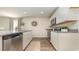 Bright kitchen featuring stainless steel appliances, granite countertops, and white cabinetry at 153 Leyland Cypress Dr, Conway, SC 29527