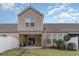 Backyard view shows the home's exterior, including sliding door and a privacy fence at 156 Parmelee Dr. # B, Murrells Inlet, SC 29576