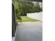 A fenced-in backyard with a concrete patio, perfect for outdoor entertainment and relaxation at 156 Parmelee Dr. # B, Murrells Inlet, SC 29576
