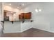 Well-lit kitchen area with granite countertops, ample cabinet space, and stainless steel appliances at 156 Parmelee Dr. # B, Murrells Inlet, SC 29576