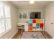 Bedroom with desk, colorful shelving, and an abundance of natural light at 1668 Greenridge Dr., Conway, SC 29526