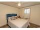 Cozy bedroom featuring a comfortable bed, plush pillows, and natural light from the window at 1668 Greenridge Dr., Conway, SC 29526