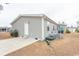 Charming home featuring a white door, vinyl siding, and a well-maintained lawn at 1668 Greenridge Dr., Conway, SC 29526