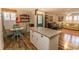 Inviting kitchen that opens into a living room filled with natural light and comfortable seating at 1668 Greenridge Dr., Conway, SC 29526