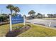 Residents' Club and Spa community signage, featuring manicured landscaping, palm trees, and parking at 1668 Greenridge Dr., Conway, SC 29526