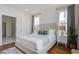 Relaxing bedroom showcases a stylish bed, natural light from windows, and a serene ambiance at 1801 Tryon Dr, Myrtle Beach, SC 29588