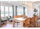 Light-filled dining area featuring seating for six and large scenic windows at 1801 Tryon Dr, Myrtle Beach, SC 29588