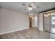 Neutral bedroom featuring a mirrored closet and ceiling fan at 2151 Clearwater Dr. # C, Surfside Beach, SC 29575