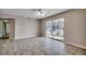 Bright living room featuring sliding glass doors for plenty of light at 2151 Clearwater Dr. # C, Surfside Beach, SC 29575