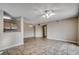 Open living area features tile floors and flows into the kitchen, great for entertaining at 2151 Clearwater Dr. # C, Surfside Beach, SC 29575