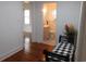 Stylish bathroom featuring a vanity, toilet, and a decorative 'welcome' sign in the window at 223 Greentown Rd., Georgetown, SC 29440