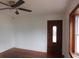 Inviting living room featuring hardwood floors and a front door with leaded glass at 223 Greentown Rd., Georgetown, SC 29440