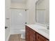 Bathroom with brown cabinets, white countertops, and a tub shower combo at 249 Venice Way # 3301, Myrtle Beach, SC 29577