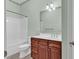 Cozy bathroom featuring brown cabinets, single sink, and a tub/shower combo at 249 Venice Way # 3301, Myrtle Beach, SC 29577