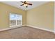 Bedroom featuring carpeted flooring, one window and yellow colored walls at 249 Venice Way # 3301, Myrtle Beach, SC 29577