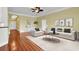 Staged living room featuring hardwood floors, neutral walls, and coordinated furniture at 249 Venice Way # 3301, Myrtle Beach, SC 29577