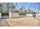 Backyard featuring white picket fence and a small storage shed at 263 Burchwood Ln., Myrtle Beach, SC 29588