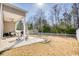 View of the backyard featuring patio, white picket fence and small storage shed at 263 Burchwood Ln., Myrtle Beach, SC 29588