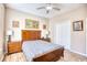 Bedroom with a large bed, matching bedside tables, and hardwood floors at 263 Burchwood Ln., Myrtle Beach, SC 29588