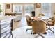 Cozy dining area with wood table and seating with view to living area with lots of natural light at 263 Burchwood Ln., Myrtle Beach, SC 29588