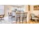 Kitchen bar seating with view of the white cabinets and stainless appliances at 263 Burchwood Ln., Myrtle Beach, SC 29588