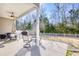 Spacious covered patio with ceiling fan, furniture, and view of the fenced backyard at 263 Burchwood Ln., Myrtle Beach, SC 29588