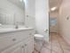 Neutral bathroom featuring a vanity, toilet, and mirror at 270 Georgetown Dr., Pawleys Island, SC 29585