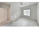 Bright bedroom featuring a ceiling fan, window, and a double-door closet at 270 Georgetown Dr., Pawleys Island, SC 29585