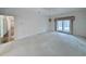 Bedroom with neutral carpet and access to a back porch at 270 Georgetown Dr., Pawleys Island, SC 29585