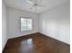 Bright, airy bedroom featuring a ceiling fan and hardwood floors at 270 Georgetown Dr., Pawleys Island, SC 29585