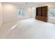 Bonus room with carpet, built-in shelving and natural light from surrounding windows at 270 Georgetown Dr., Pawleys Island, SC 29585