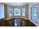 Breakfast nook with three windows offering views of the backyard pool and patio area at 270 Georgetown Dr., Pawleys Island, SC 29585