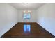 Empty dining room with chandelier and hardwood floors at 270 Georgetown Dr., Pawleys Island, SC 29585