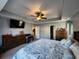 This bedroom features a ceiling fan, a view to another room, and lots of space at 3108 Robins Nest Way, Myrtle Beach, SC 29579