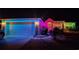 Festive home exterior illuminated with colorful holiday lights at nighttime at 3108 Robins Nest Way, Myrtle Beach, SC 29579