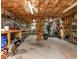 Unfinished basement with exposed ceiling, shelving, and ample space for storage at 3178 River Bluff Ln., Little River, SC 29566