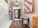 Bright foyer featuring ceramic tile floors, decorative rug, and decorative accents at 3178 River Bluff Ln., Little River, SC 29566