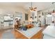 Inviting living room with hardwood floors, vaulted ceilings, and neutral color palette at 3178 River Bluff Ln., Little River, SC 29566