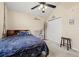 Cozy bedroom boasts ample closet space and stylish Paris-themed decor at 3471 Spivey St., Loris, SC 29569