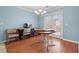 Cozy dining area featuring a chandelier, French doors, and laminate flooring at 3471 Spivey St., Loris, SC 29569