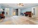 Bright, open living room with a large window and light blue walls, waiting for personalization at 3471 Spivey St., Loris, SC 29569