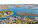 Stunning aerial view of waterfront homes with private docks and lush marshlands in the background at 3567 Marion Ln., Murrells Inlet, SC 29576