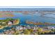 Aerial view showcases a waterfront community with stunning blue waters and marshland at 3567 Marion Ln., Murrells Inlet, SC 29576