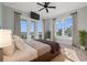 Inviting bedroom with balcony access showcasing water views, featuring neutral decor and plenty of natural light at 3567 Marion Ln., Murrells Inlet, SC 29576