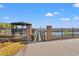 A waterfront dock with brick pilars, a gazebo, and black metal fence at 3567 Marion Ln., Murrells Inlet, SC 29576