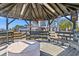 Waterfront gazebo with seating, lighting, and tranquil views of the surrounding area at 3567 Marion Ln., Murrells Inlet, SC 29576