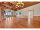 Bright and airy living room with wood floors and large glass doors leading to water views at 3567 Marion Ln., Murrells Inlet, SC 29576